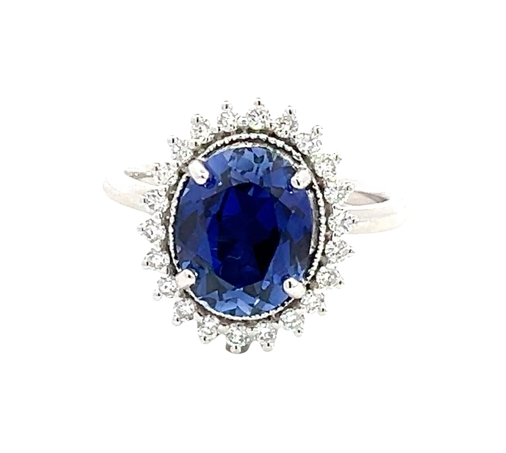 LAB GROWN OVAL BLUE SAPPHIRE AND DIAMONDS 4.11ctw HALO RING
