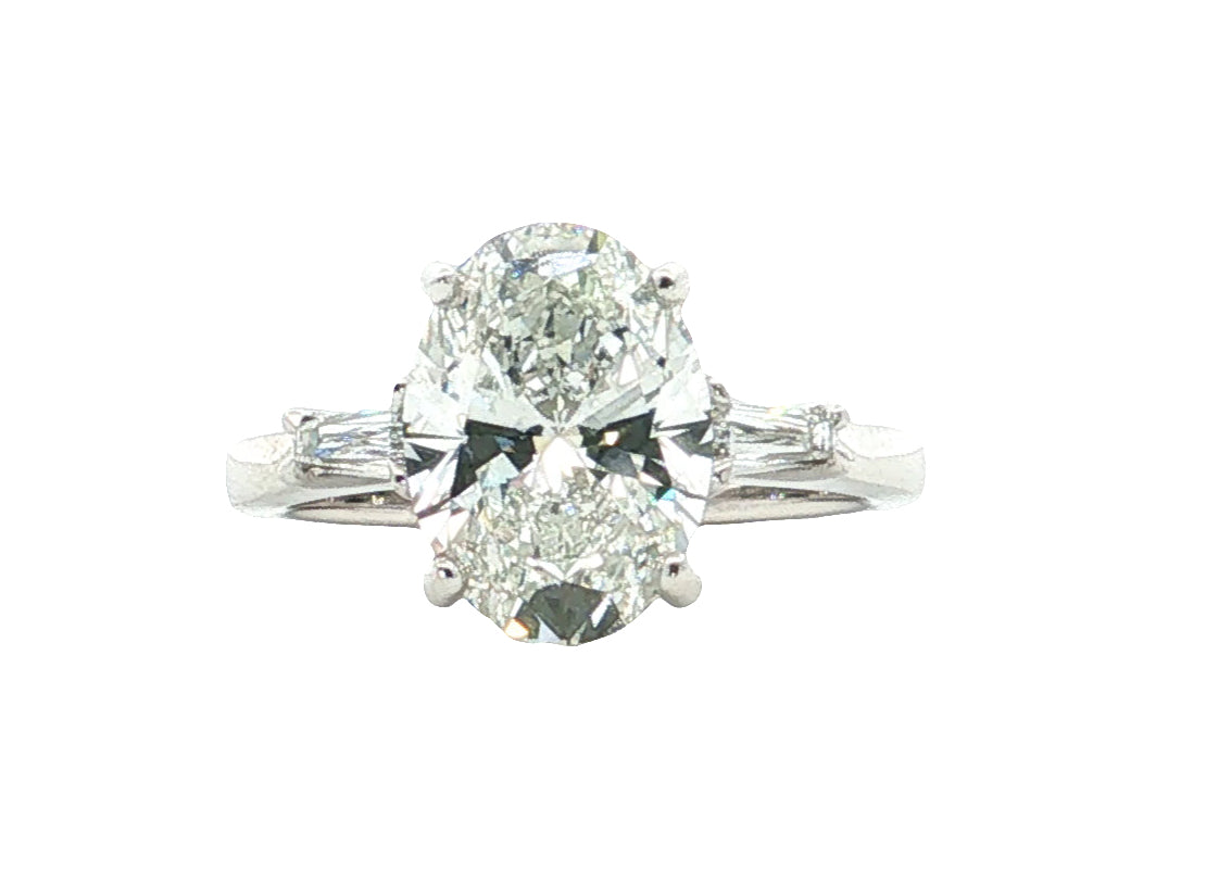 LAB GROWN OVAL AND BAGUETTE DIAMONDS 3.20ctw THREE STONE RING