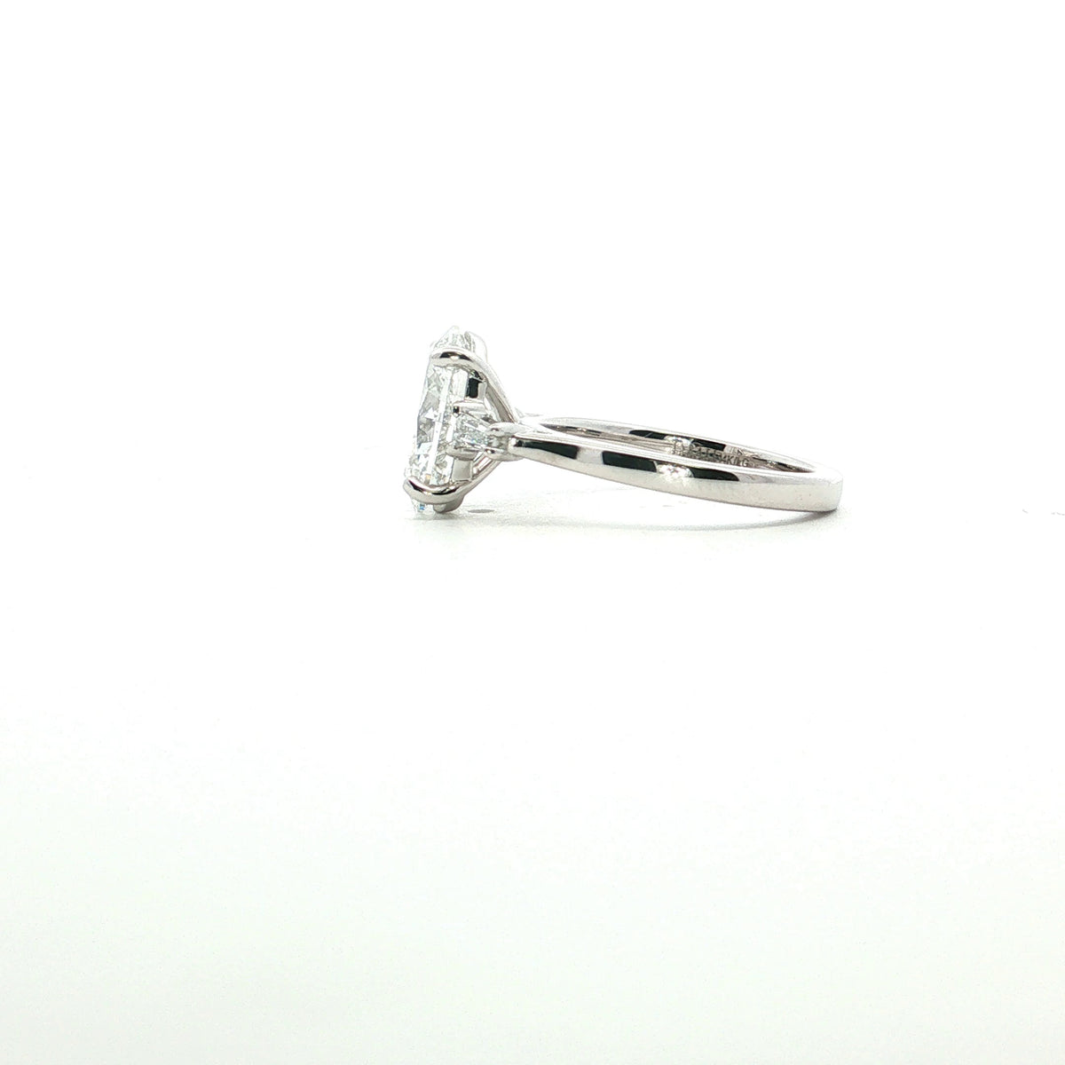 LAB GROWN OVAL AND BAGUETTE DIAMONDS 3.20ctw THREE STONE RING