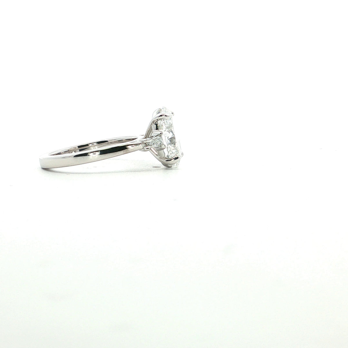 LAB GROWN OVAL AND BAGUETTE DIAMONDS 3.20ctw THREE STONE RING