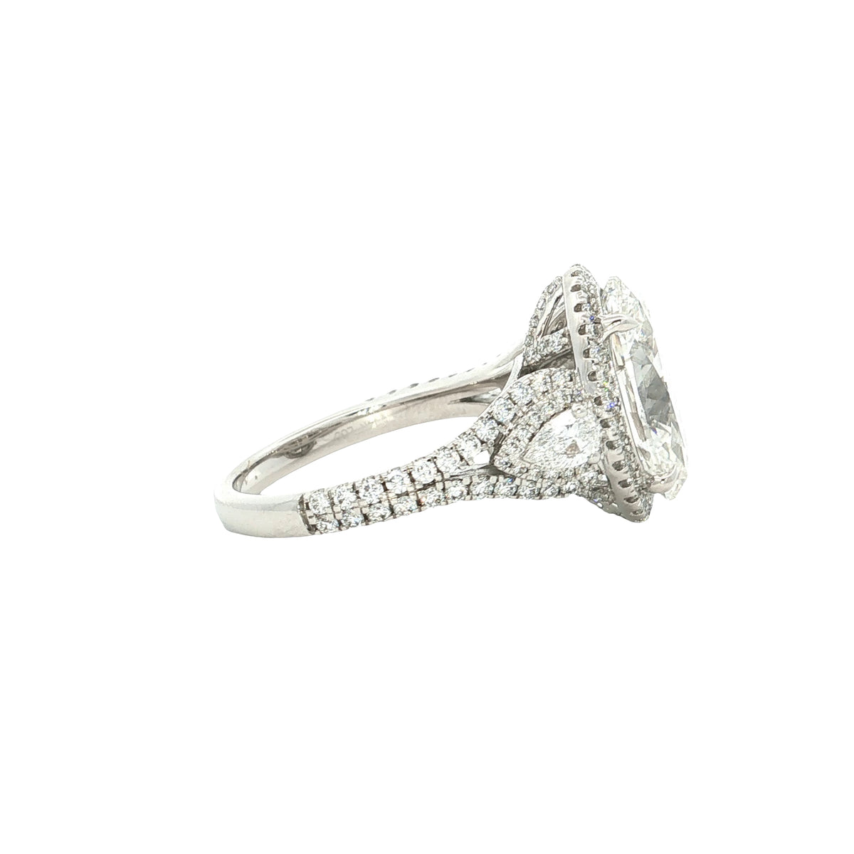 LAB GROWN OVAL, PEAR AND ROUND DIAMONDS 6 1/4ctw HALO RING