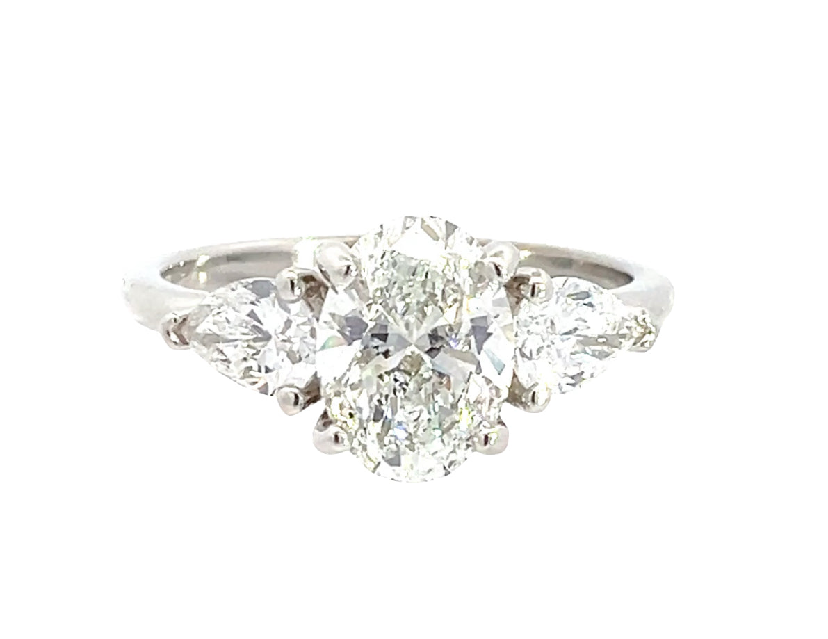 LAB GROWN OVAL AND PEAR DIAMONDS 2.34ctw THREE STONE RING