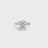 3.49 CTW oval lab-grown diamond engagement ring in 14KT white gold, featuring a 3.04 CT center diamond and diamond-accented band.