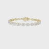 Video showcasing a 14KT yellow gold lab-grown pear diamond tennis bracelet, highlighting its diamond arrangement, setting, and clasp.